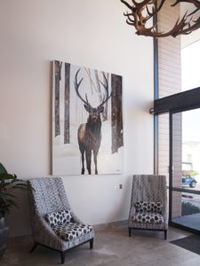 Deer painting in modern lodge decor